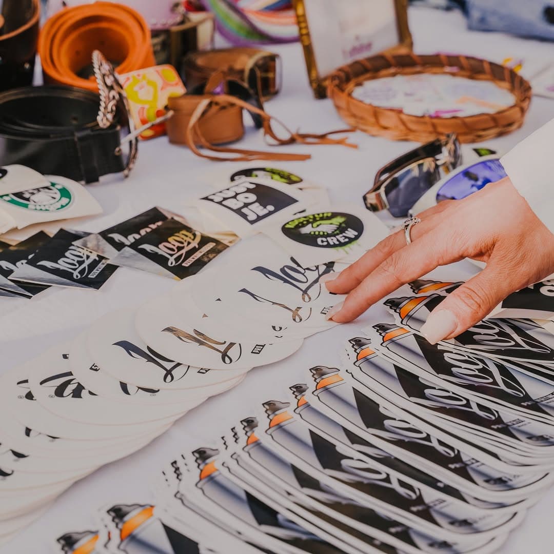 Young artist spraying a mural